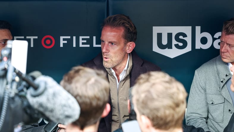 Minnesota Twins owner and head of baseball Tom Pohlad speaking with reporters in the Target Field dugout